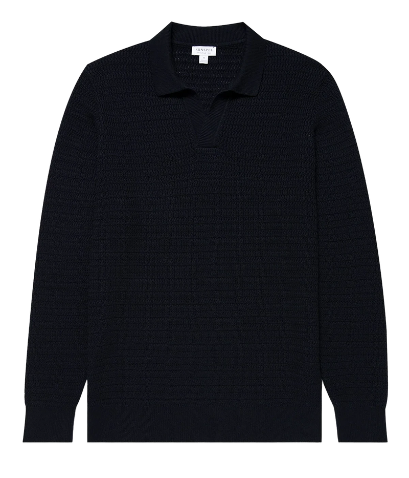 Navy open-stitch polo in premium Egyptian cotton, featuring a buttonless collar, ribbed trims, and a soft, breathable design.