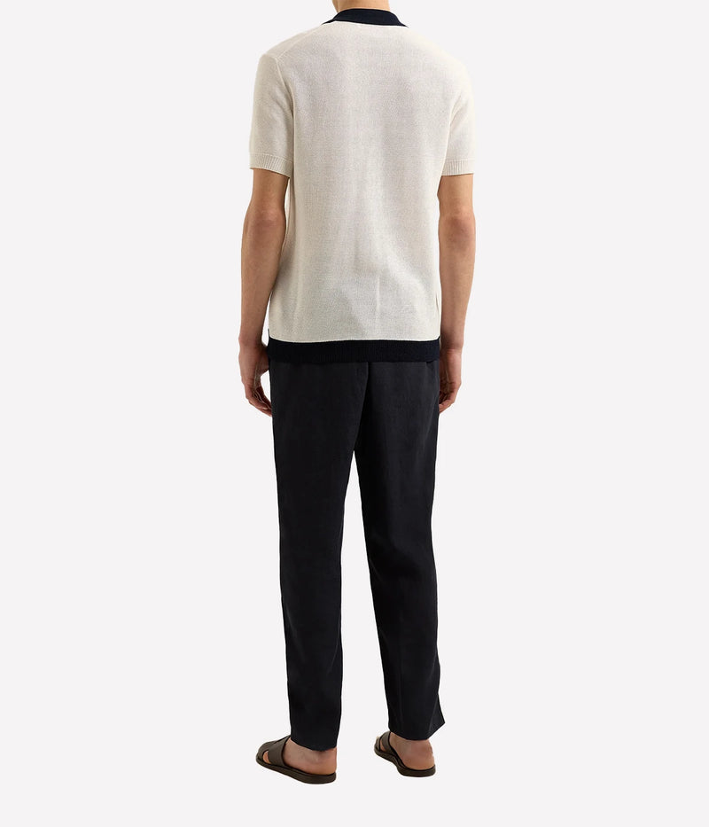 Men’s Tiernan classic fit shirt made from organic mercerised cotton piqué with Milano collar and contrast stripe stitch detail, displayed under soft candlelight.