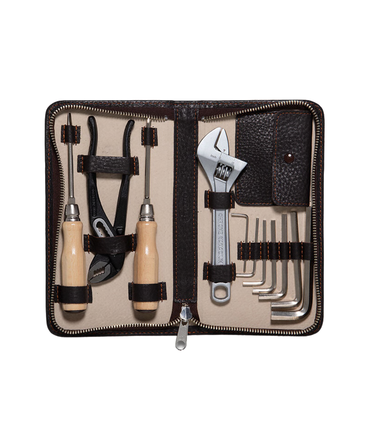 F. Hammann brown cowhide leather tool kit handmade in Germany, featuring screwdriver set, wrench, pliers, and Allen keys in a compact zip case.
