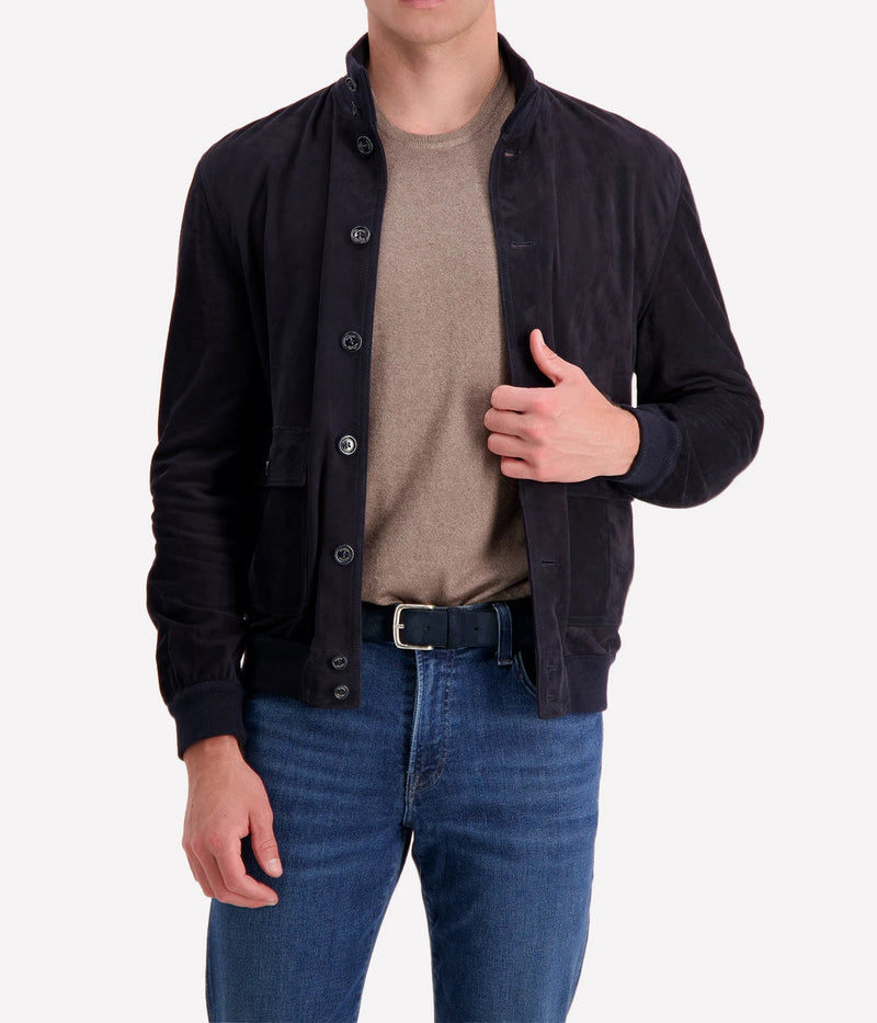 The Valstar Suede Jacket, a modern twist on the classic A1 flight jacket, featuring a luxurious goat suede texture and ribbed trims for a sporty yet sophisticated silhouette.