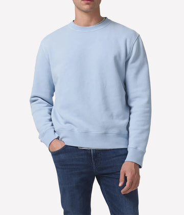 A vintage inspired casual crewneck sweater, in a pale blue colourway, with crew neck detail, textured hem and cuff line. Elevated Loungewear, comfortable, cotton, everyday basic. 