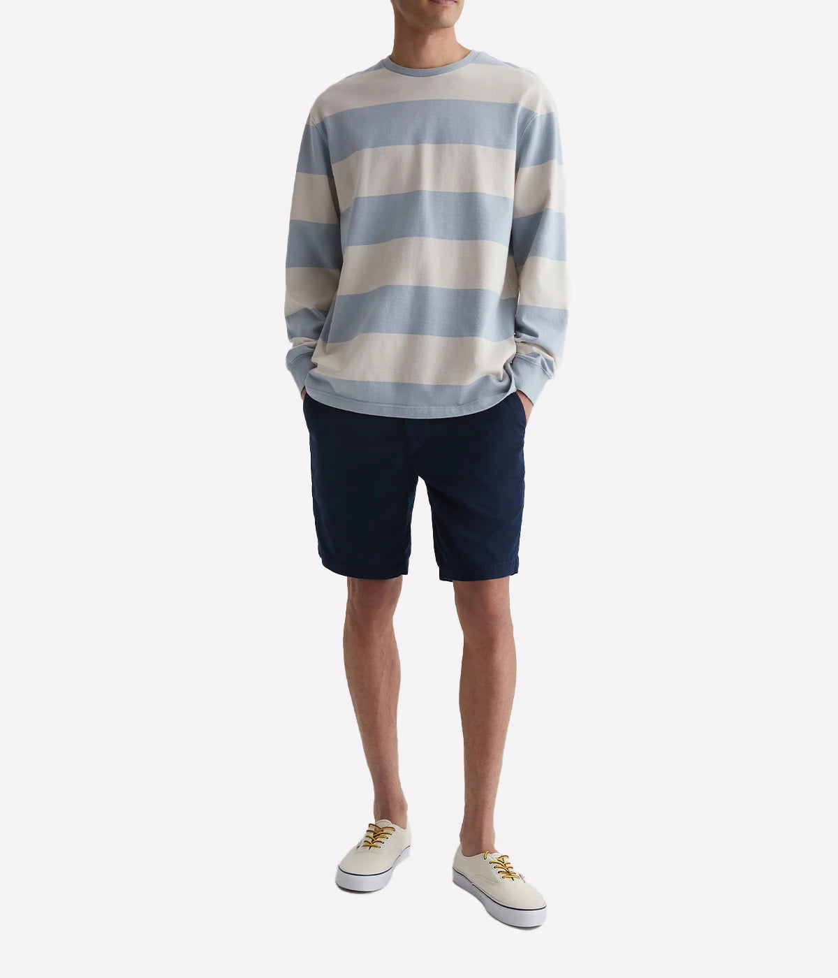 AG Wanderer Shorts styled with a sweatshirt and sneakers, showcasing a relaxed yet polished outfit for versatile, everyday wear.