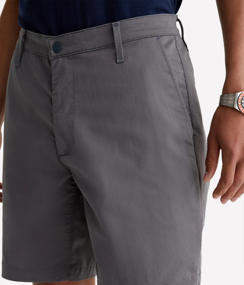 Close-up of the AG Wanderer Shorts, showing fine stitching, tailored pocket detailing, and smooth cotton fabric texture.