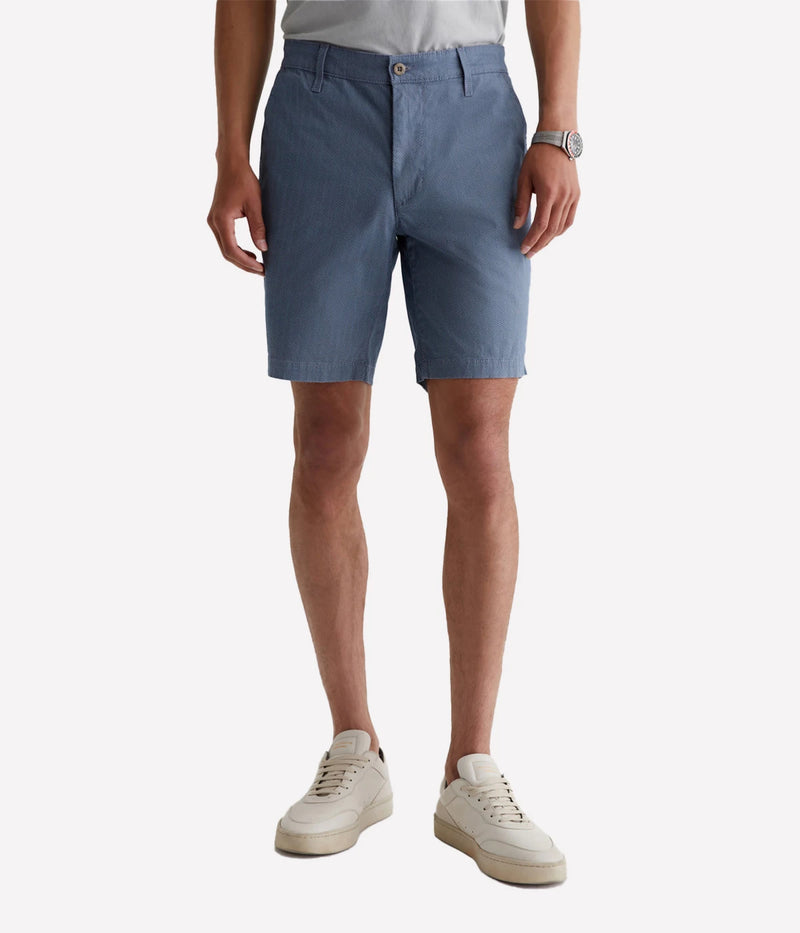 Front view of the AG Wanderer Shorts for men, showcasing a clean trouser-inspired design with a slim fit and slightly tapered legs.