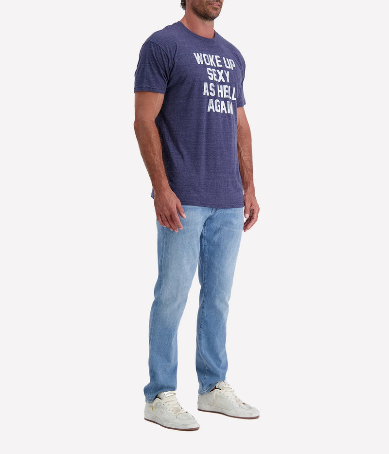 Retro-inspired "Woke Up Sexy" graphic T-shirt in a soft tri-blend fabric, perfect for effortless statement style.