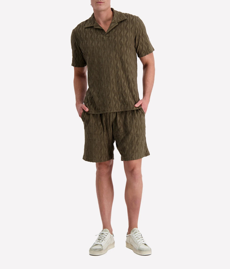 Men's Augusto Shorts by Frescobol Carioca in lightweight cotton with a relaxed fit, elasticated waist, zip-fly, side pockets, and back buttoned pocket.