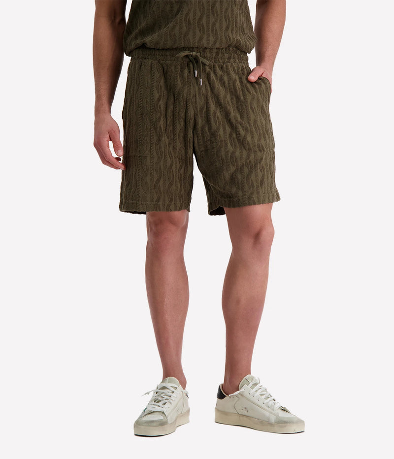 Men's Augusto Shorts by Frescobol Carioca in lightweight cotton with a relaxed fit, elasticated waist, zip-fly, side pockets, and back buttoned pocket.