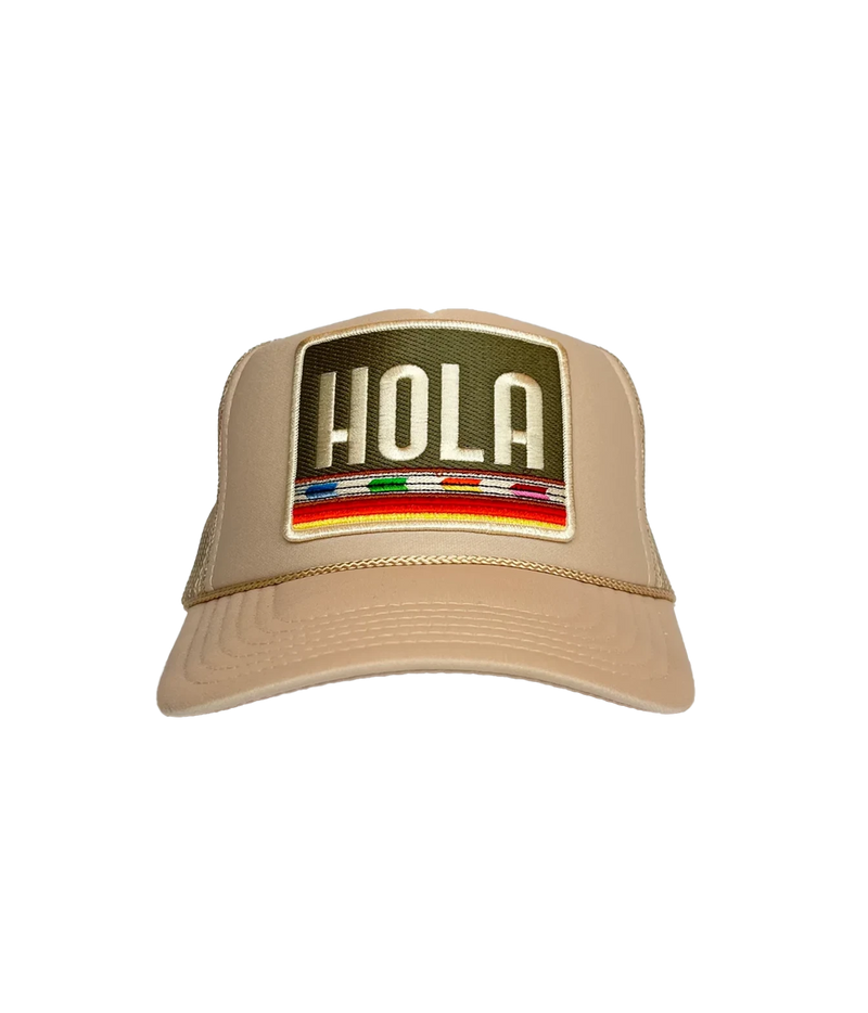 Front view of Port Sandz Hola Trucker Hat in Cream showing the embroidered HOLA patch