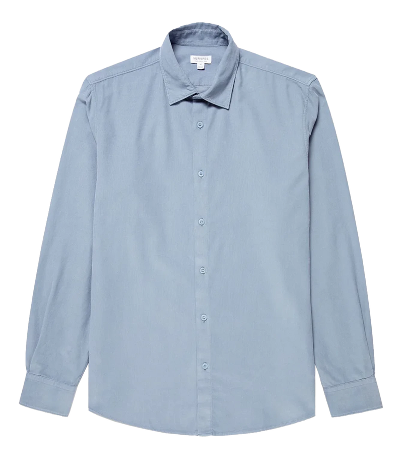 A light blue long-sleeve button-down shirt with a classic collar, laid flat against a solid white background.