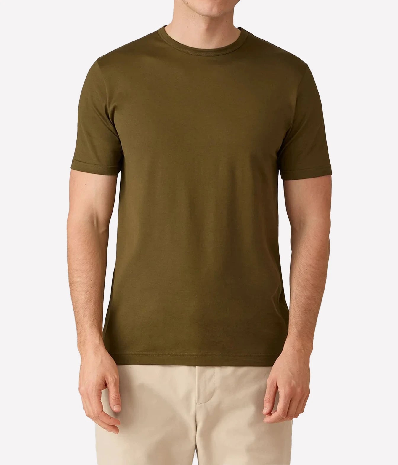 A man wearing a solid olive green short-sleeve crewneck t-shirt and beige pants, shown from the neck down against a light gray background.