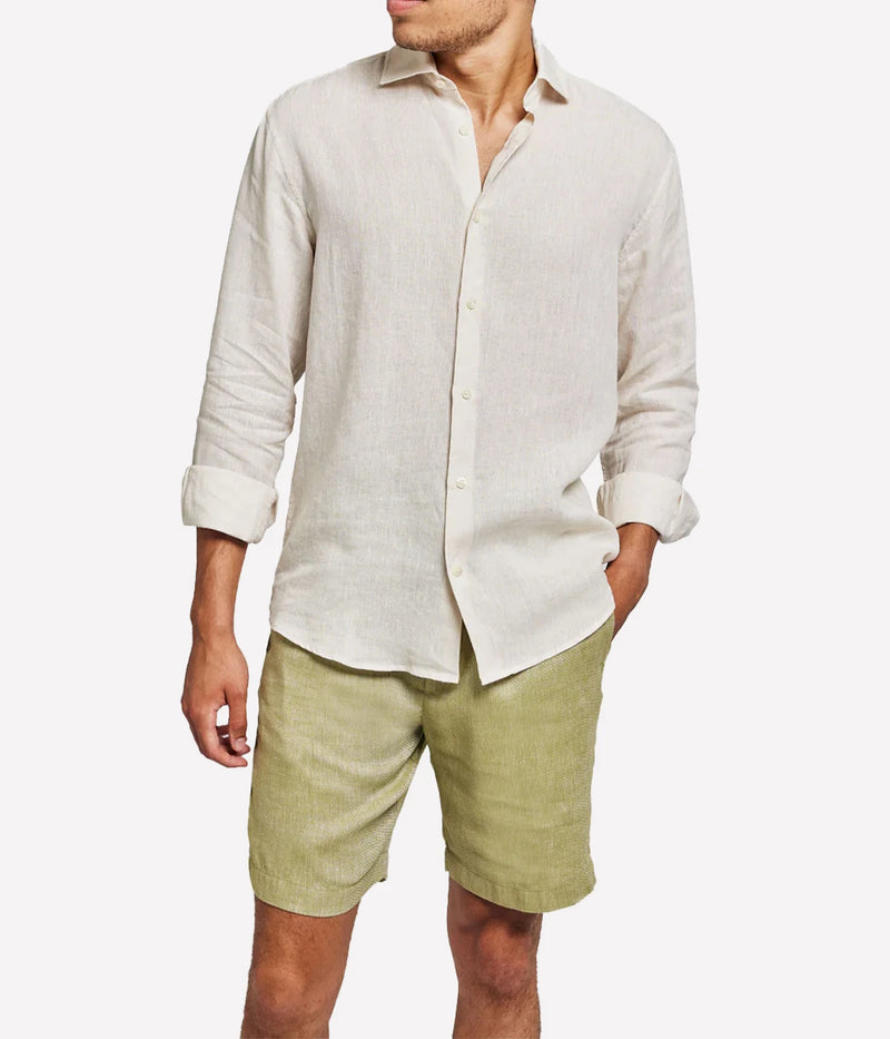 Front view of the Antonio Long Sleeve Linen Shirt by Frescobol Carioca, crafted from 100% fine Italian linen. This luxury men's dress shirt features a structured dress collar with stiffeners, imitation mother of pearl buttons, and a full placket. Designed in a regular fit, it blends relaxed tailoring with refined style for effortless occasion dressing.