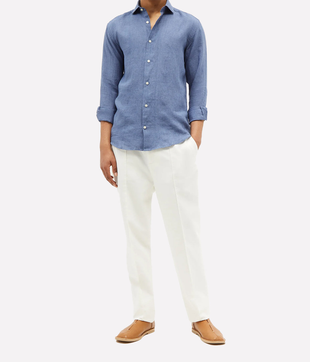 Model wearing the Antonio Long Sleeve Linen Shirt by Frescobol Carioca, showcasing the refined tailoring and premium 100% Italian linen fabric. The structured dress collar, long sleeves, and imitation mother of pearl buttons make this shirt a sophisticated choice for formal or relaxed occasions.