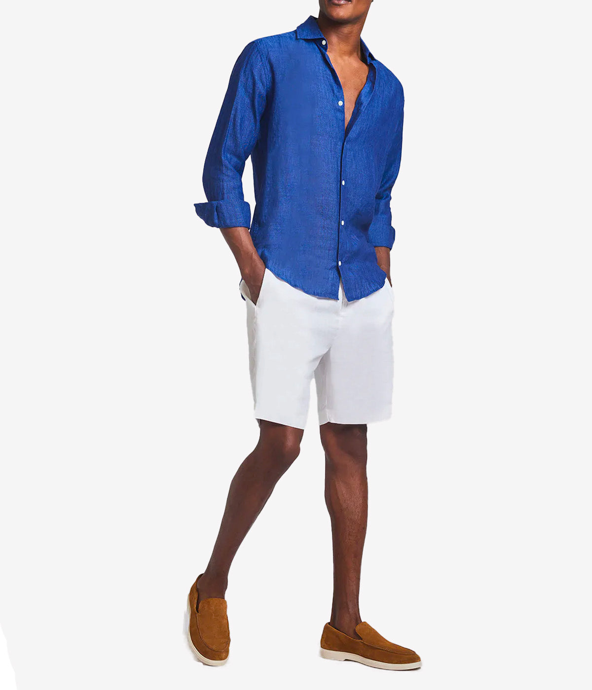 Model wearing the Antonio Long Sleeve Linen Shirt by Frescobol Carioca, showcasing the refined tailoring and premium 100% Italian linen fabric. The structured dress collar, long sleeves, and imitation mother of pearl buttons make this shirt a sophisticated choice for formal or relaxed occasions.