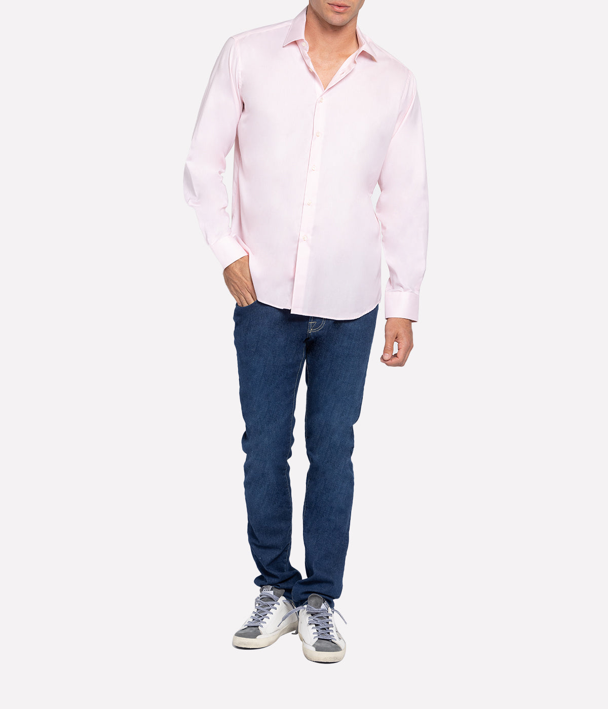 Model wearing the Antonio Long Sleeve Linen Shirt by Frescobol Carioca, showcasing the refined tailoring and premium 100% Italian linen fabric. The structured dress collar, long sleeves, and imitation mother of pearl buttons make this shirt a sophisticated choice for formal or relaxed occasions.