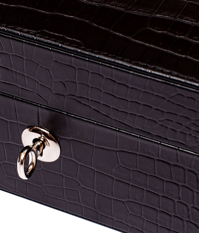 Side view of the Brompton 5-piece watch box in black leather, highlighting the gold lock and key. The elegant box is lined with premium suede for added protection and sophistication.