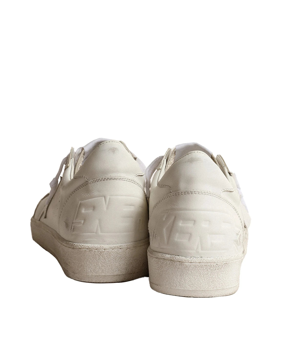 Golden Goose Ball Star sneakers in Optic White, featuring a leather upper and signature star. Inspired by an American college vibe, blending basketball and skate culture. The white leather inserts and tonal laces complete the timeless, stylish look.