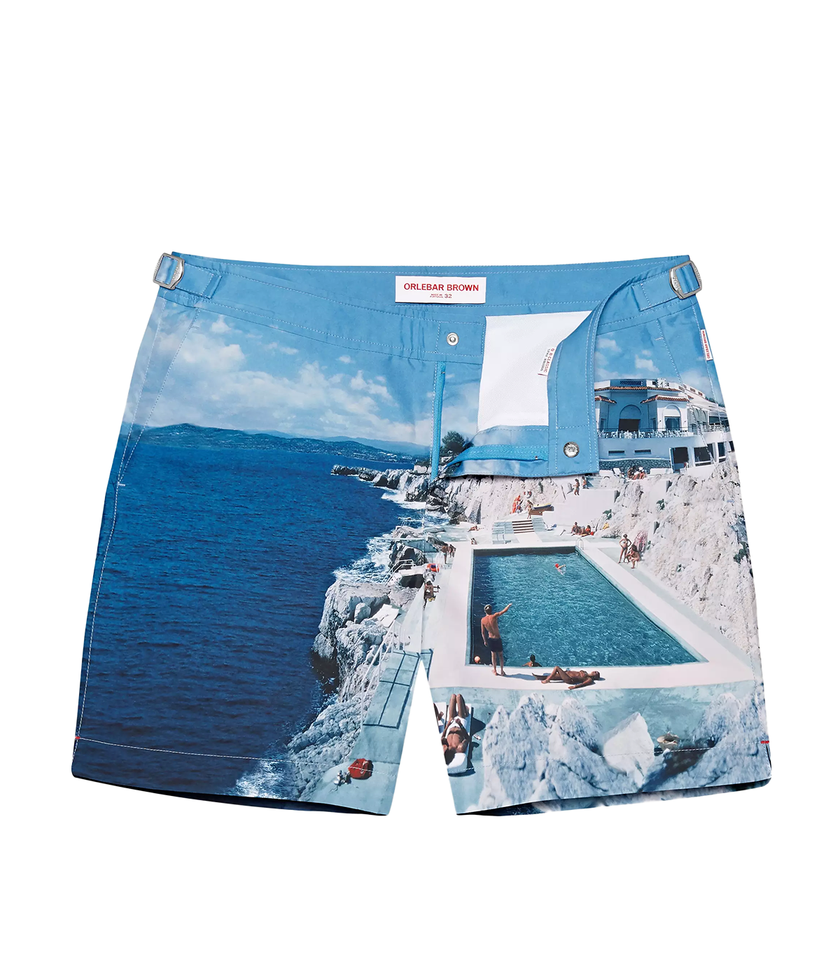 Orlebar Brown Bulldog Swim Shorts featuring a Slim Aarons medley of inviting blues from the iconic Roc Pool shot, offering effortless style and quick-dry fabric for ultimate summer versatility.