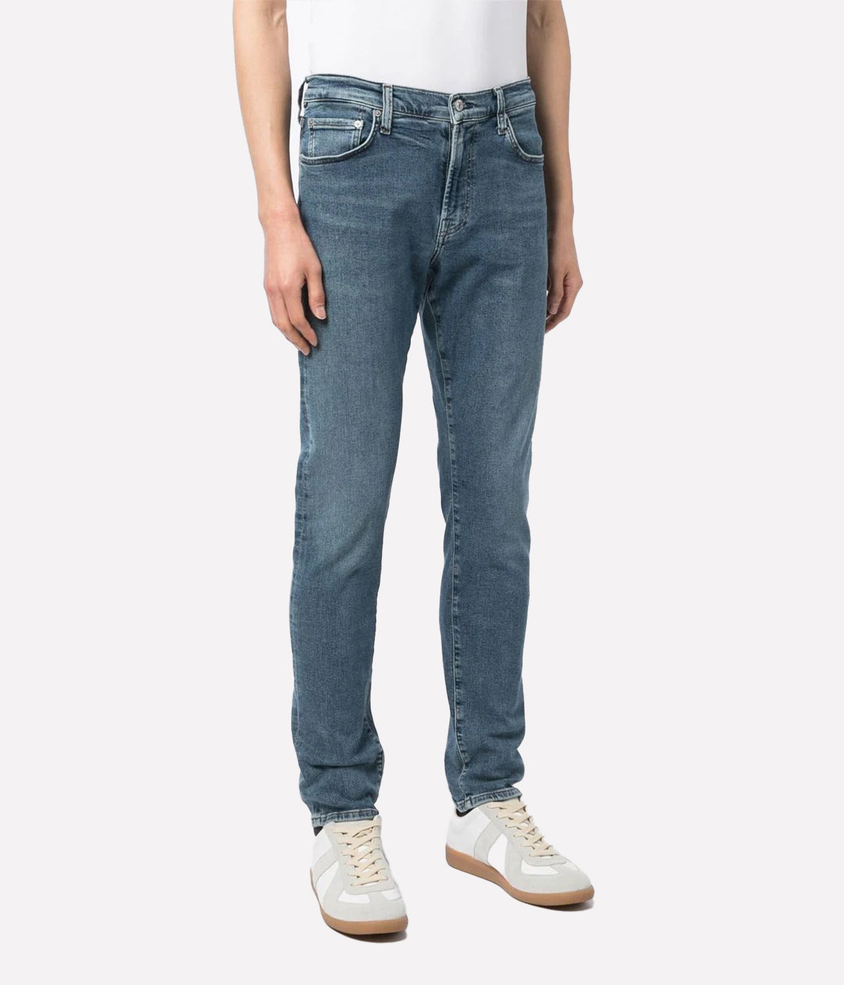 Side profile of the London Slim Taper jeans, showcasing the streamlined fit and durable Perform denim fabric.