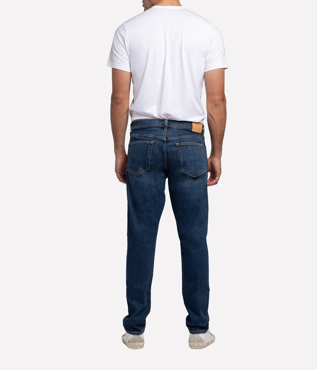 Back view of the jeans, featuring the signature Citizens of Humanity stitching on the pockets and sleek tapered leg.