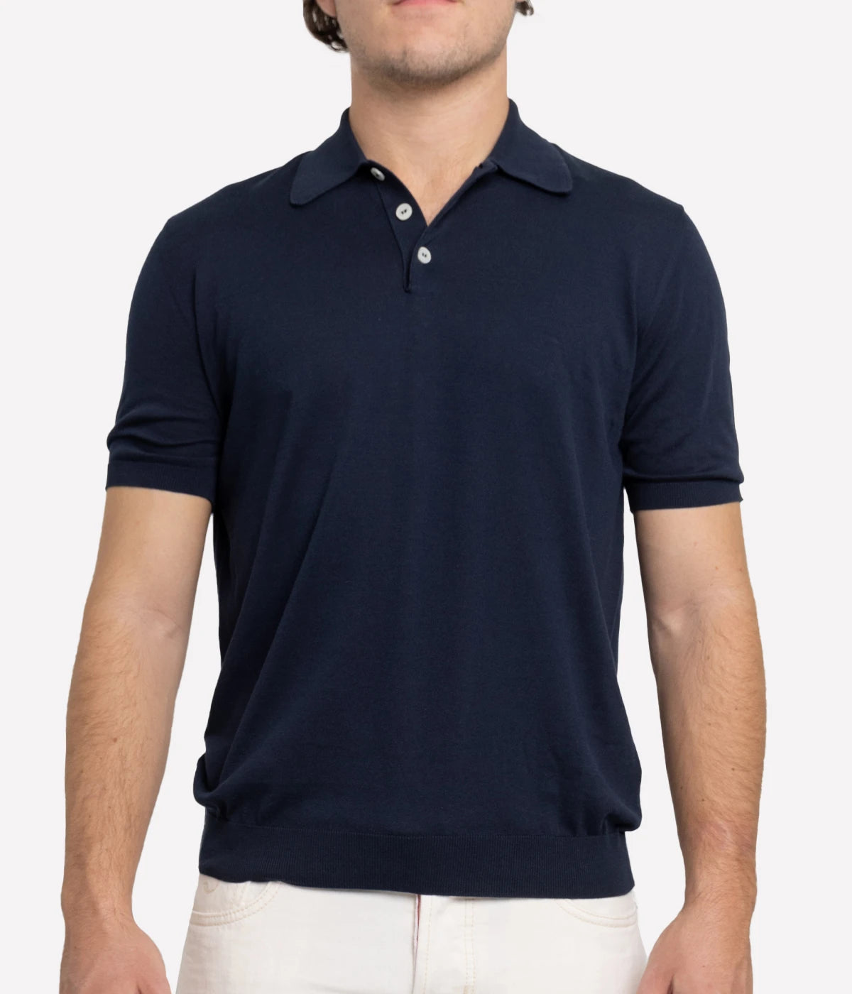 Short sleeve polo by Eleventy, crafted from cotton crepe with an 18-gauge finesse and dyed-in-chief finish. Features mother-of-pearl buttons and a regular fit, blending comfort and sophistication