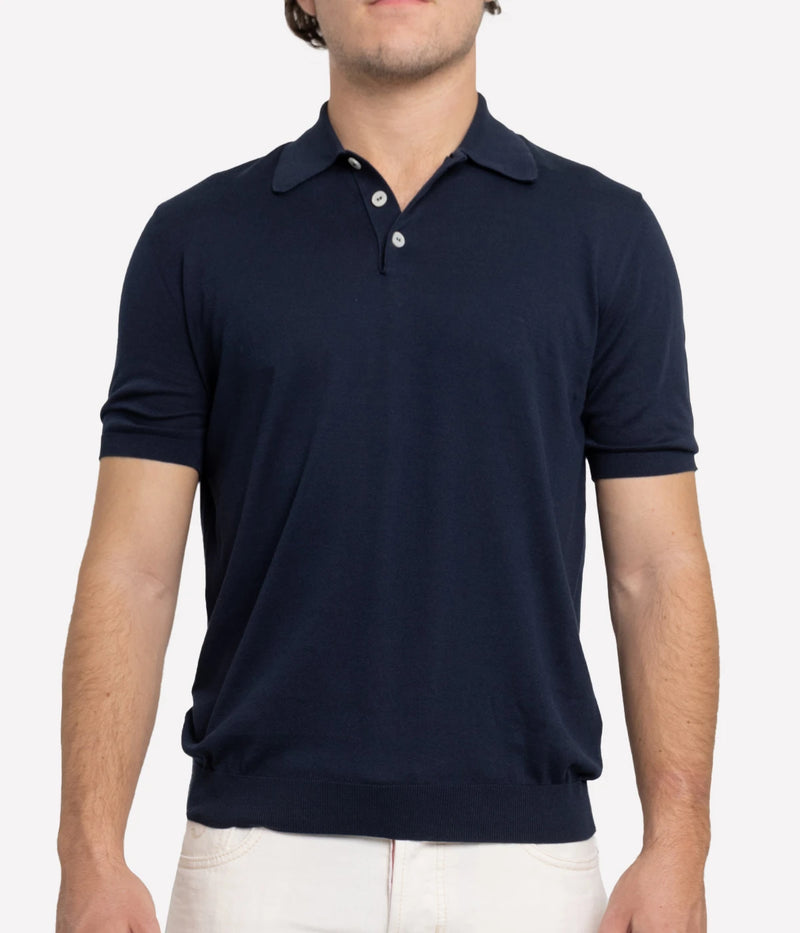 Short sleeve polo by Eleventy, crafted from cotton crepe with an 18-gauge finesse and dyed-in-chief finish. Features mother-of-pearl buttons and a regular fit, blending comfort and sophistication