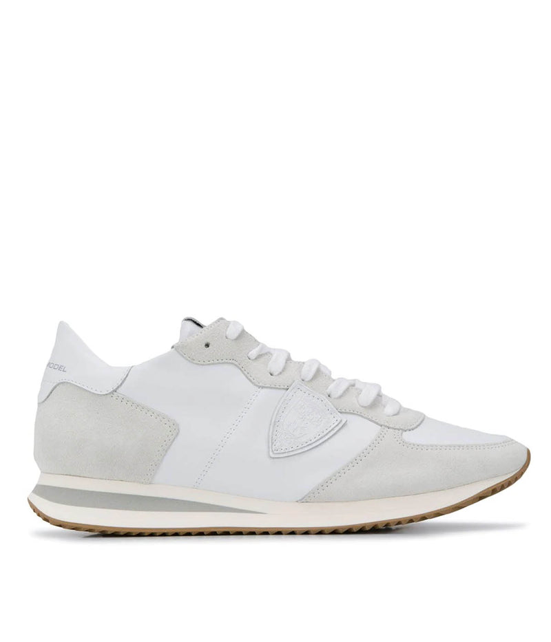 Side view of Philippe Model TRPX sneakers, showcasing their retro-inspired silhouette and modern treatments. The mix of premium materials and bold design elements make them ideal for stylish urban looks.