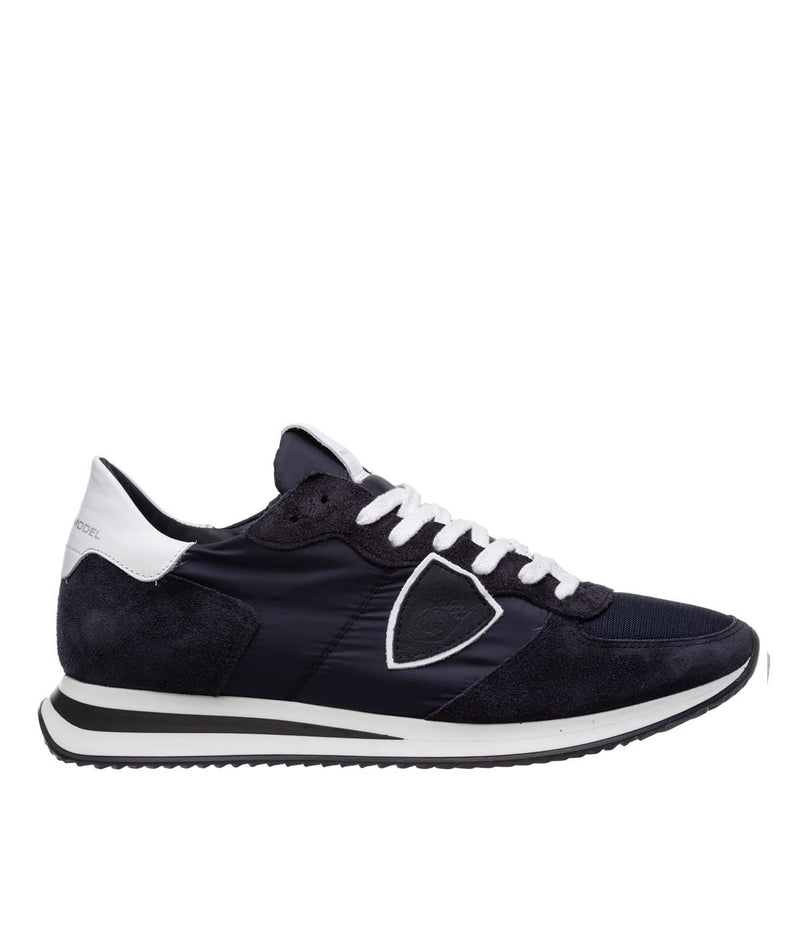 Side view of Philippe Model TRPX sneakers, showcasing their retro-inspired silhouette and modern treatments. The mix of premium materials and bold design elements make them ideal for stylish urban looks.