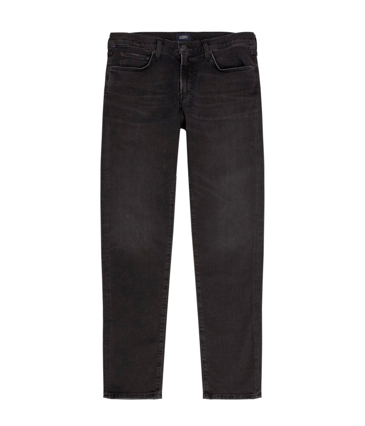 A flat lay of the Citizens of Humanity London Slim Taper jeans, showcasing their clean slim, tapered fit and tonal stitching.